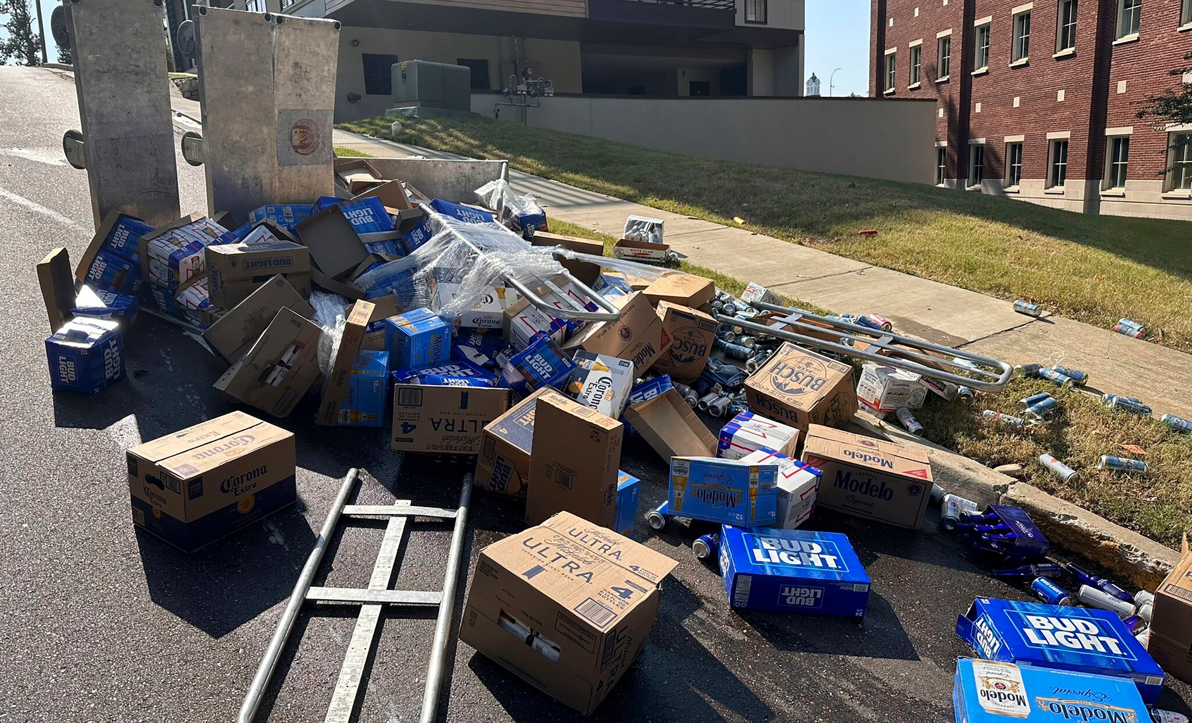 CORRECTS STATE TO MISS. NOT MASS. This image provided by the Oxford Police Department shows a street closed due to an 18 wheeler losing part of its load, Wednesday, Aug. 21, 2024 in Oxford, Miss. (Oxford Police Department via AP)