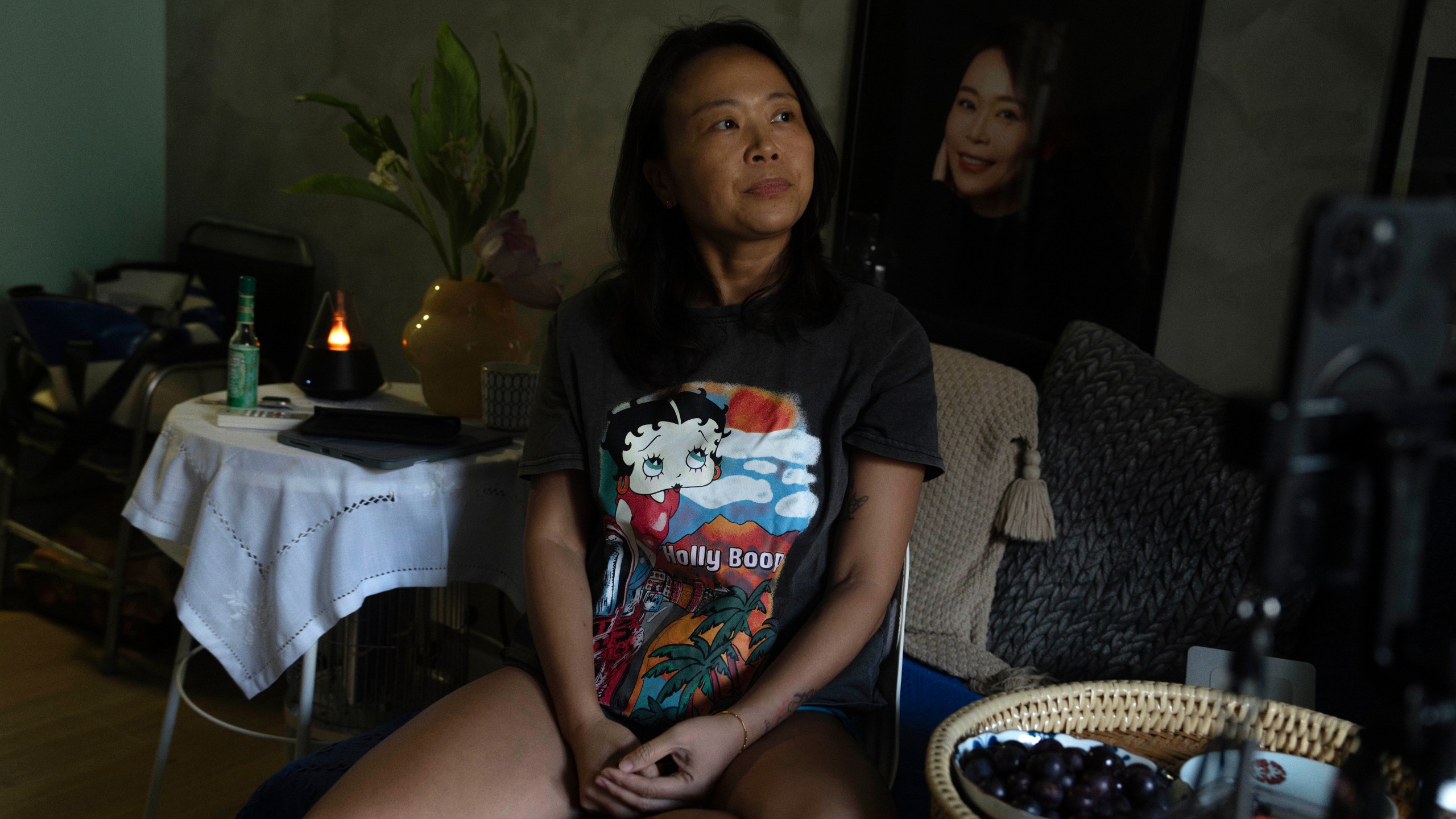Zhang Peiyi, a Shanghai resident, reacts during an interview at her home in Shanghai on July 31, 2024. (AP Photo/Ng Han Guan)