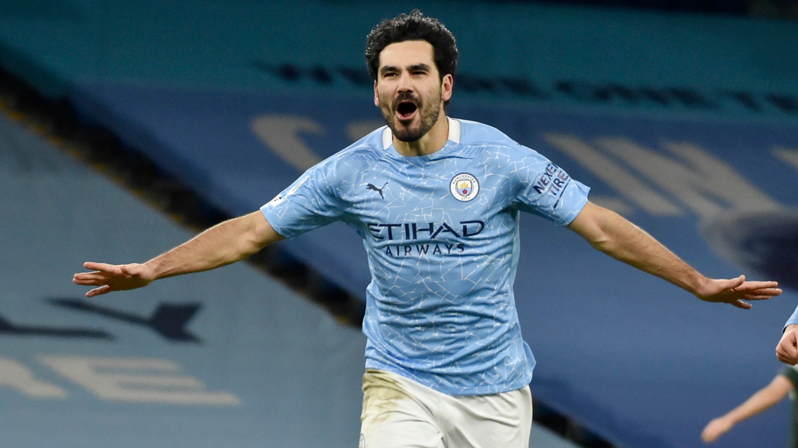 FILE - Manchester City's Ilkay Gundogan celebrates after scoring his side's third goal during the English Premier League soccer match between Manchester City and Tottenham Hotspur at Etihad Stadium, Manchester, England, on Feb. 13, 2021. Ilkay Gundogan is back at Manchester City for a sequel few could have expected. (AP photo/Rui Vieira, Pool File)