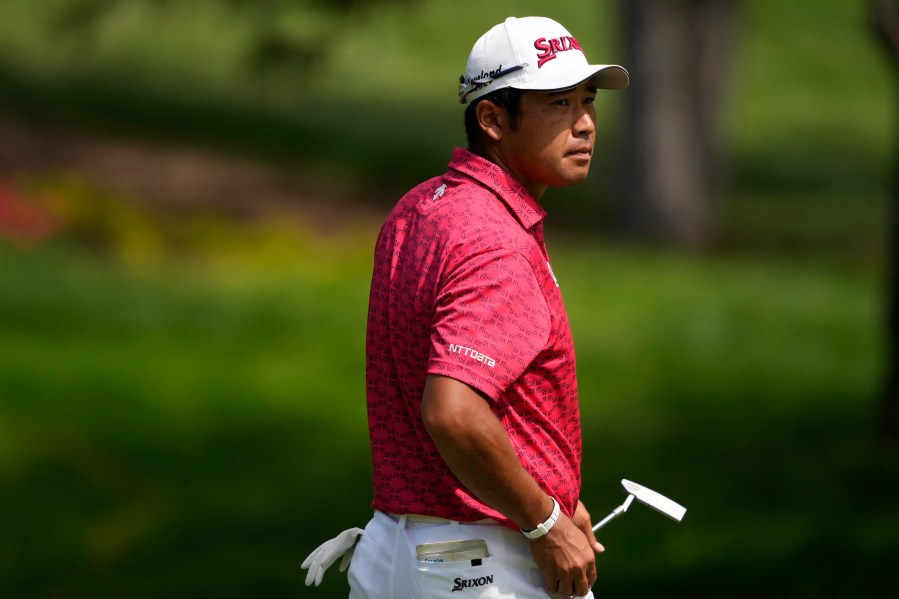 Hideki Matsuyama, of Japan, walks across the 14th green during the first round of the BMW Championship golf event at Castle Pines Golf Club, Thursday, Aug. 22, 2024, in Castle Rock, Colo. (AP Photo/Matt York)