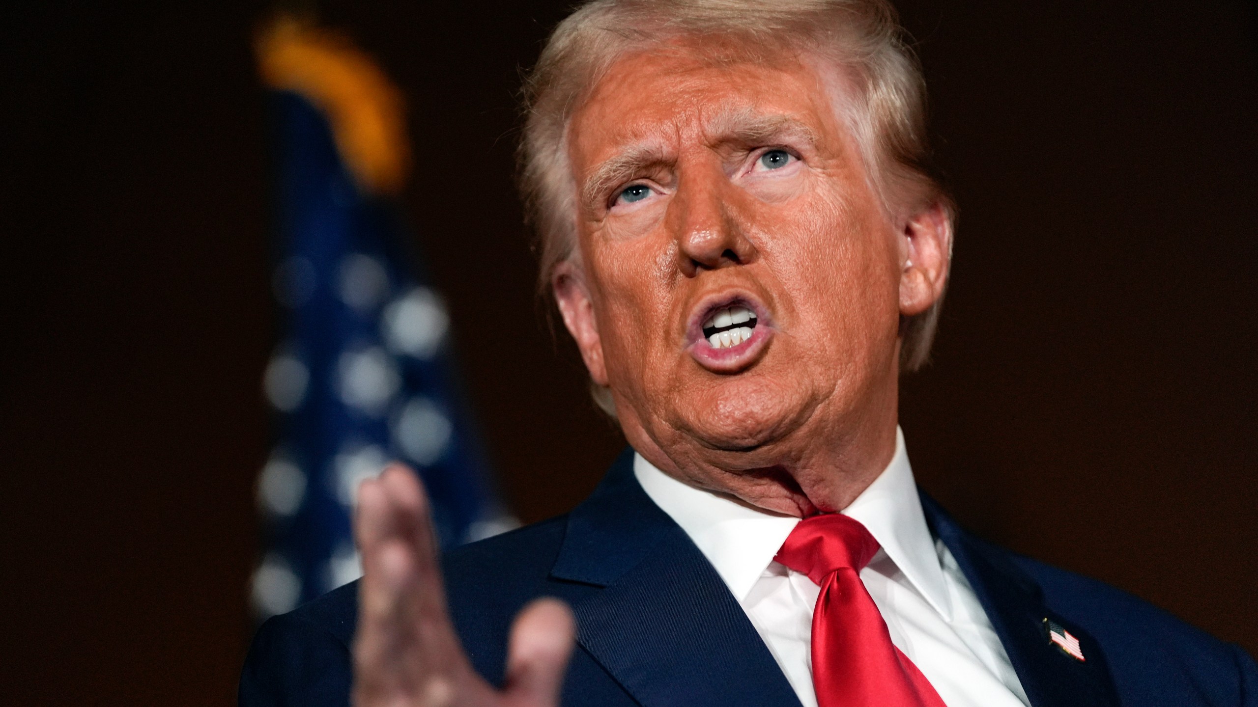 Republican presidential nominee former President Donald Trump talks with reporters at a campaign event at ll Toro E La Capra, Friday, Aug. 23, 2024, in Las Vegas. (AP Photo/Julia Nikhinson)