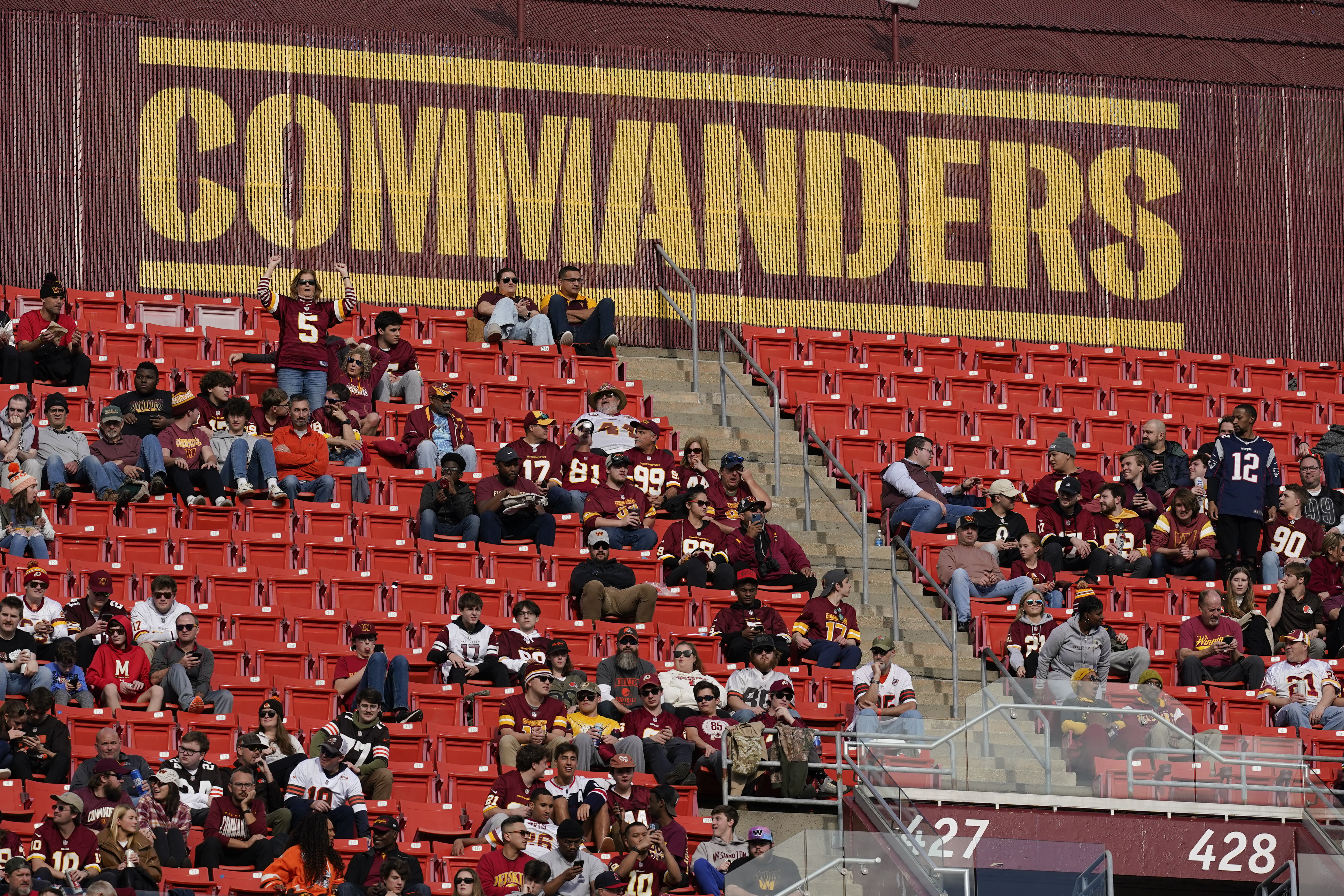 FILE - Fans watch the second half of an NFL football game between the Cleveland Browns and the Washington Commanders, Sunday, Jan. 1, 2023, at FedEx Field in Landover, Md. (AP Photo/Patrick Semansky, File)