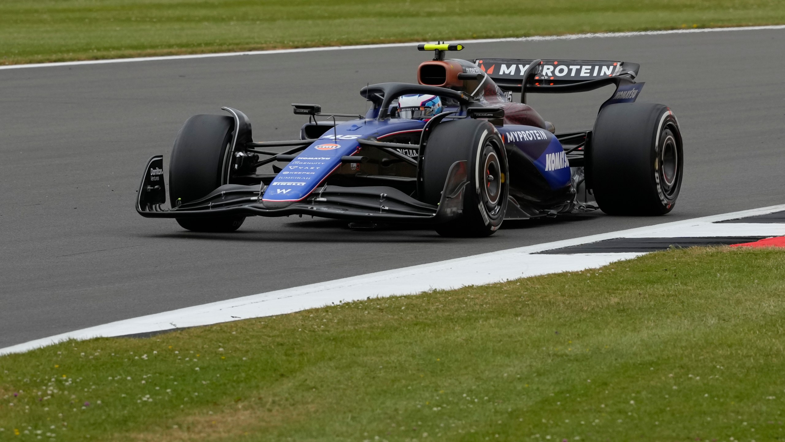 FILE - Williams driver Franco Colapinto of Argentina steers his car at the Silverstone racetrack in Silverstone, England, July 5, 2024. (AP Photo/Luca Bruno, File)
