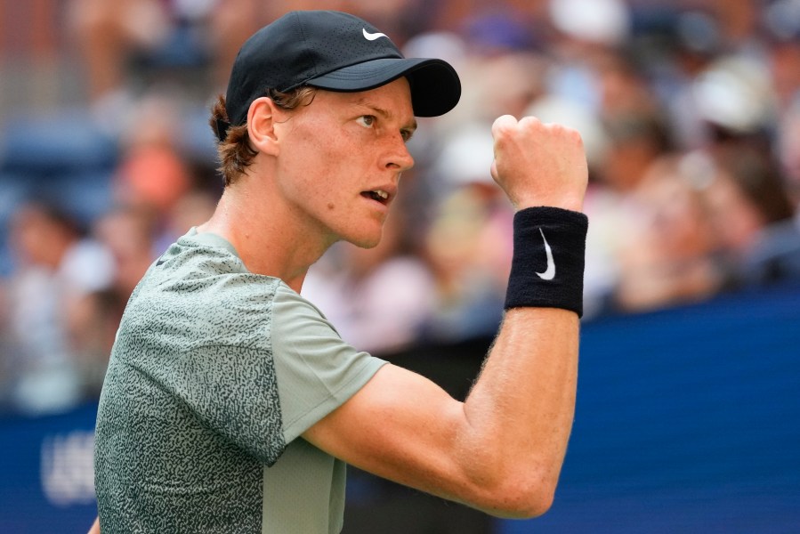 Jannik Sinner, of Italy, reacts after scoring a point against Mackenzie McDonald, of the United States, during the first round of the U.S. Open tennis championships, Tuesday, Aug. 27, 2024, in New York. (AP Photo/Kirsty Wigglesworth)
