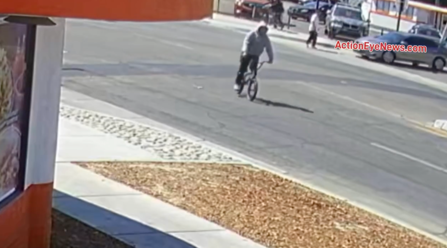 The suspect, riding a bicycle, makes a U-turn and pulls up alongside the victims in Hemet on Aug. 14, 2024. (Action Eye News)
