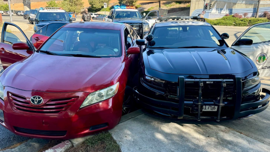 The suspect's red Toyota Camry sedan crashed into a police vehicle during a pursuit on August 13, 2024. (Upland Police Department)