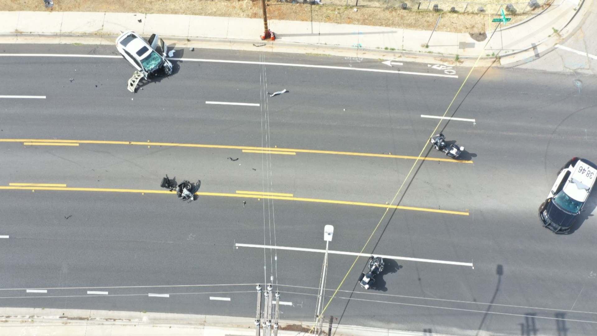 The suspect's white Honda was totaled after colliding head-on with another vehicle in a deadly Riverside crash on May 16, 2023. (Riverside Police Department)