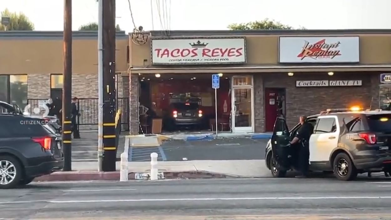 A woman was arrested after intentionally crashing her car into a taco shop in Canoga Park on August 9, 2024. (Citizen)