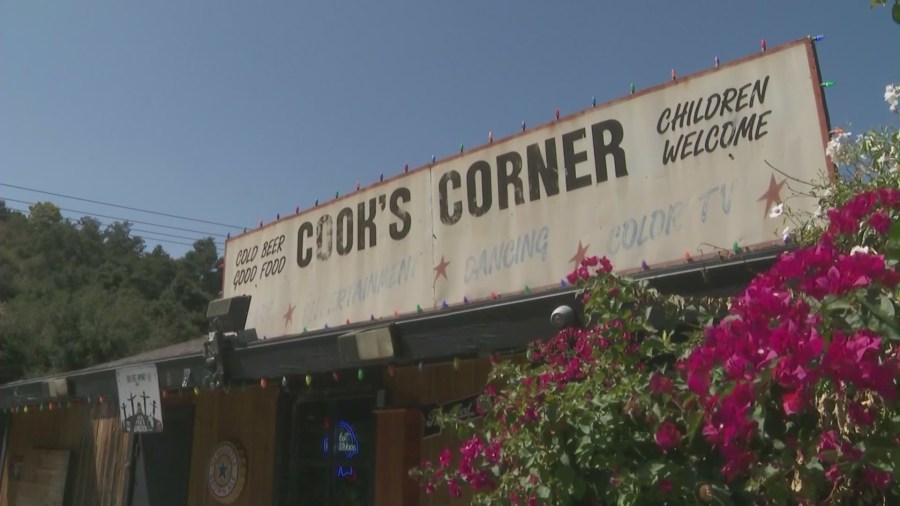 The popular biker bar, Cook's Corner in Trabuco Canyon, held a candlelight vigil on August 23, 2024, marking the one year anniversary of a deadly mass shooting. (KTLA)