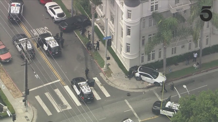 A suspect in a reportedly stolen BMW was arrested after a high-speed pursuit ended in a crash in Koreatown on August 1, 2024. (KTLA)