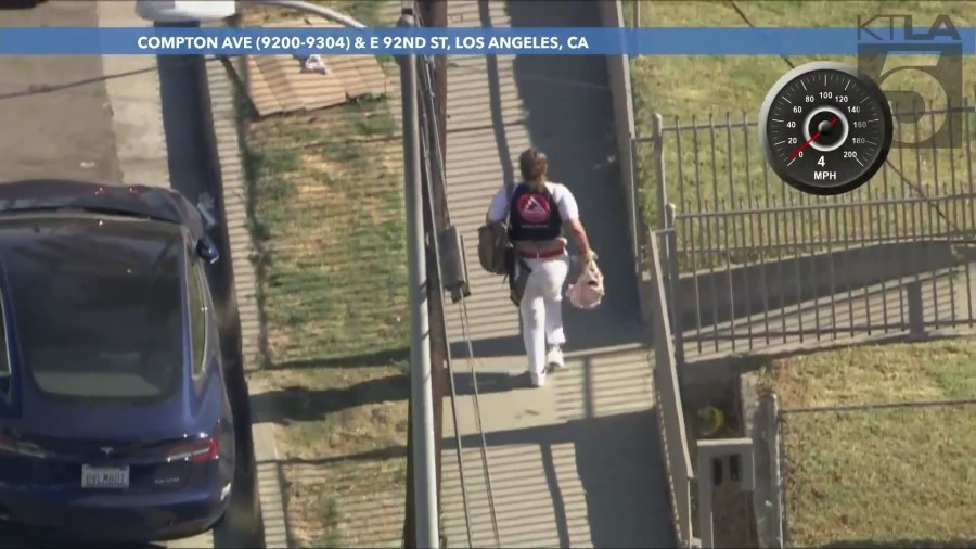 The woman began slowing down and walking several blocks in a neighborhood on August 16, 2024. (KTLA)