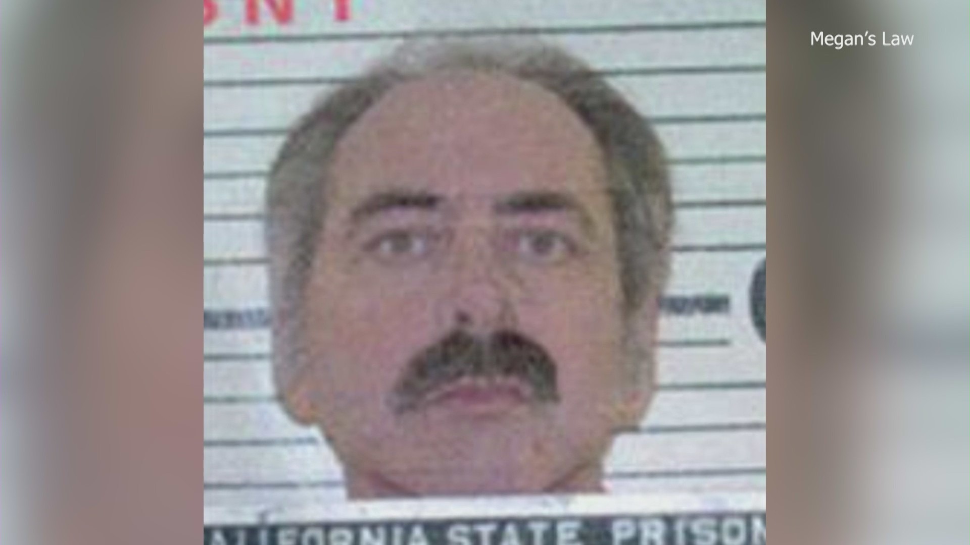 Charles William Mix, is seen in an old booking photo from the Riverside Police Department.