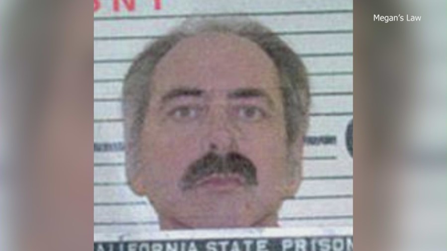 Charles William Mix, is seen in an old booking photo from the Riverside Police Department.