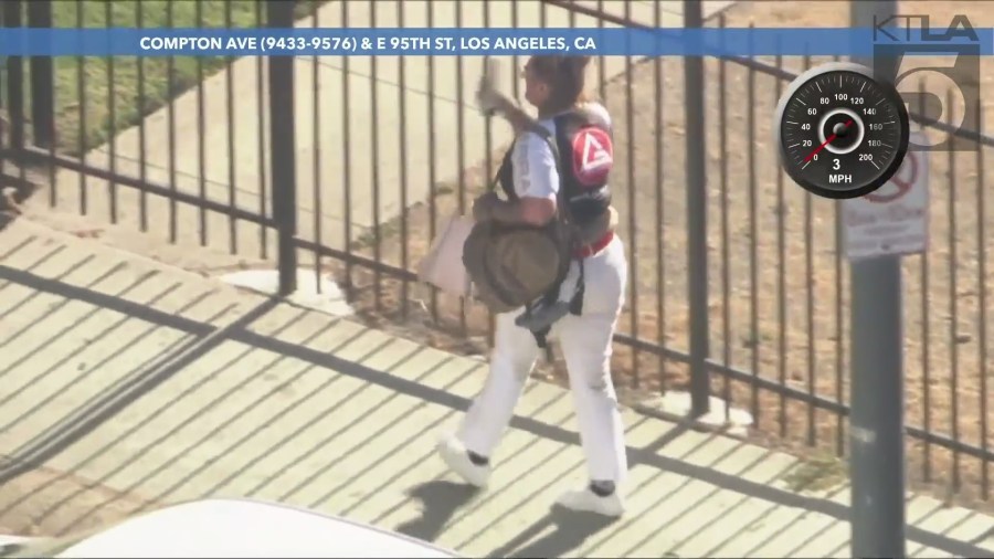 The suspect attempted to hitchhike a ride from passing vehicles as authorities continued tracking the suspect on August 16, 2024. (KTLA)
