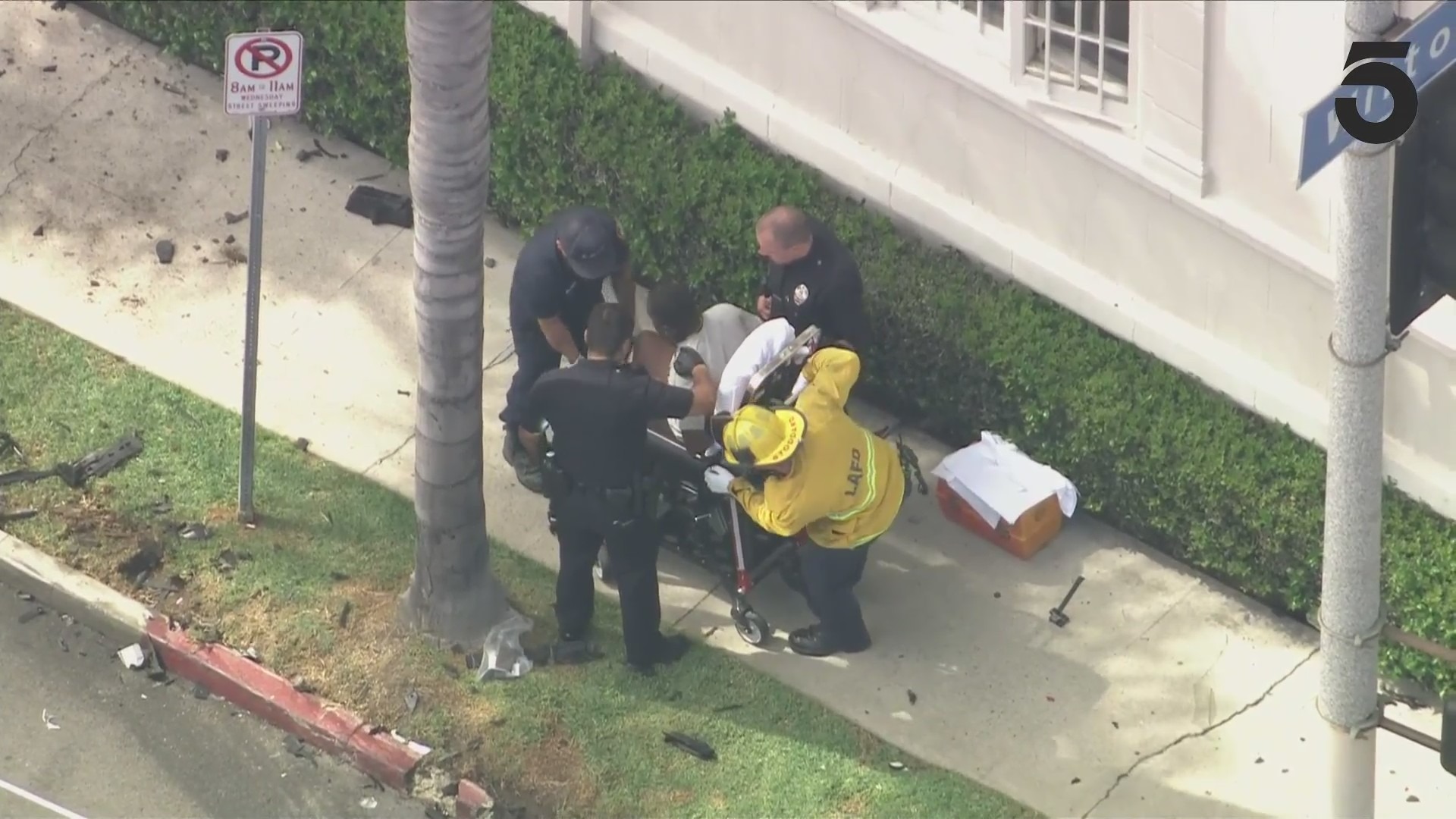 The male suspect was transported to the hospital for injury treatment. (KTLA)
