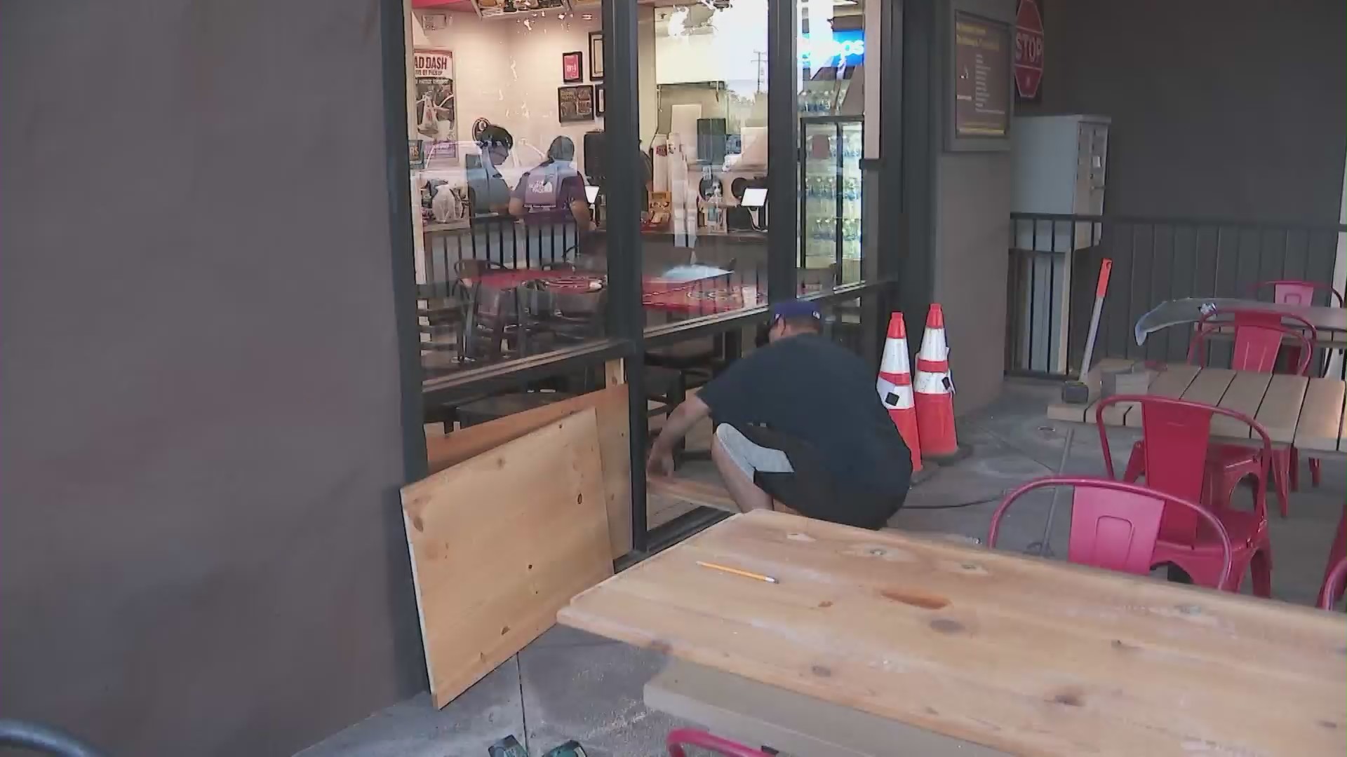 The owners of Teriyaki Madness restaurant are working to clean up the destruction left behind by a burglar. (KTLA)