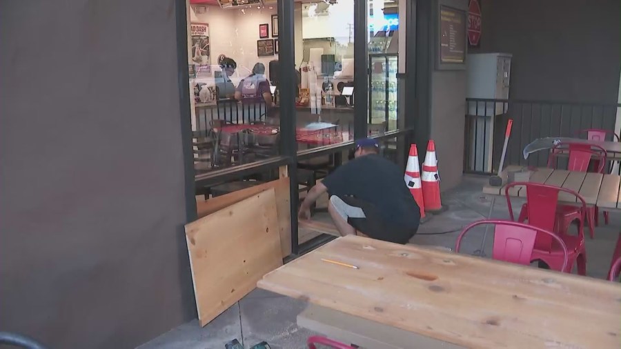 The owners of Teriyaki Madness restaurant are working to clean up the destruction left behind by a burglar. (KTLA)
