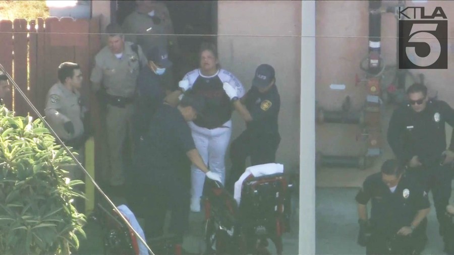 The female suspect was found inside the Watts apartment building and was reportedy injured as officers took her into custody on August 16, 2024. (KTLA)
