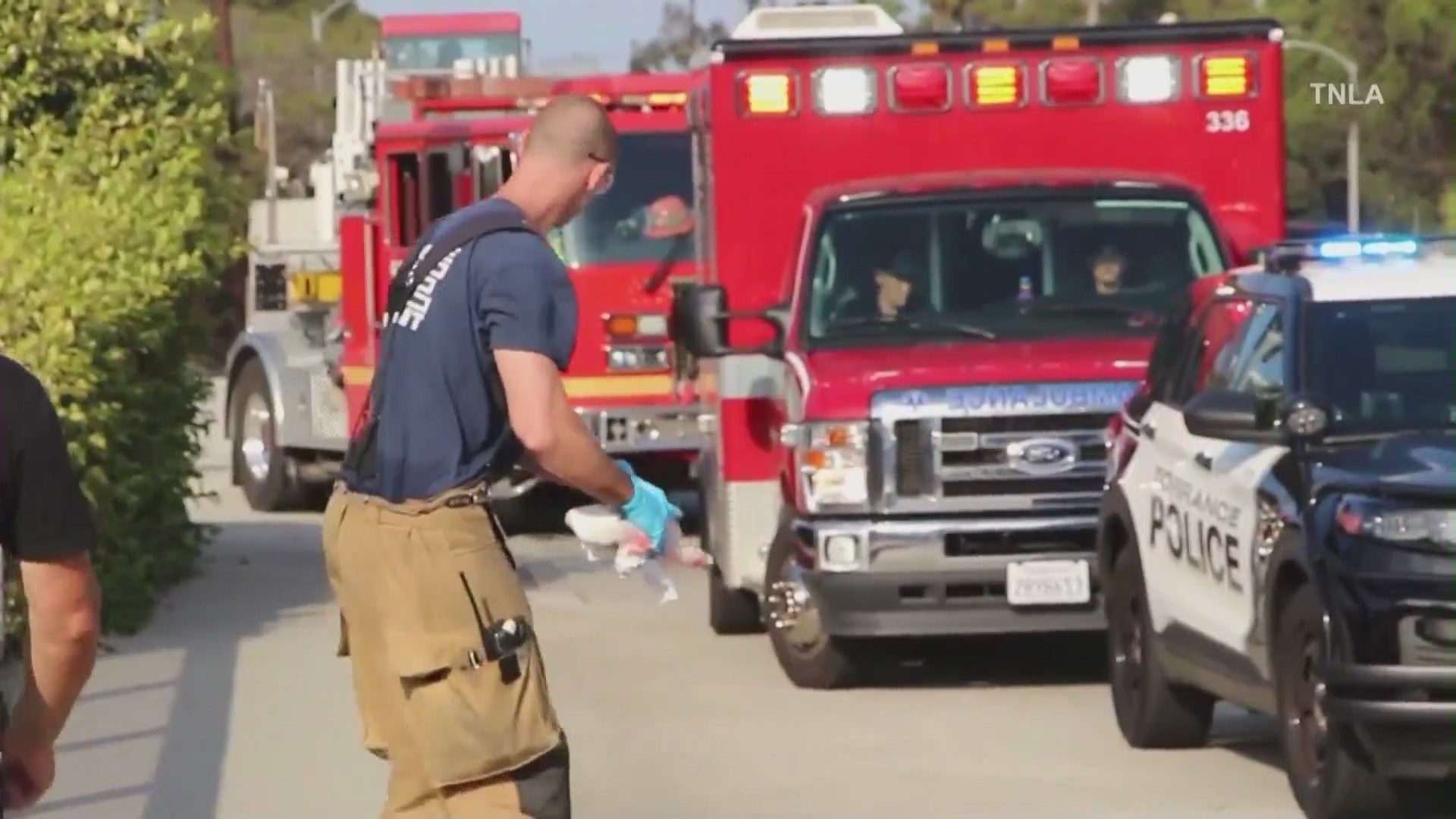Paramedics rushed a woman with stab wounds to the hospital after she was allegedly stabbed by her son in an attempted murder-suicide at El Camino College in Torrance on August 9, 2024. (TNLA)