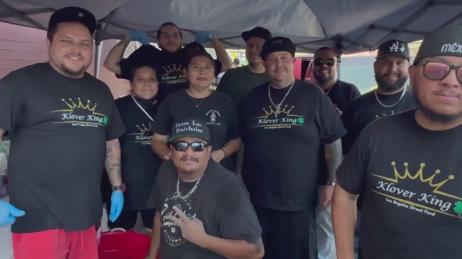 Chris Bailey's crew serves up food to homeless residents in downtown L.A.'s Skid Row. (KTLA)