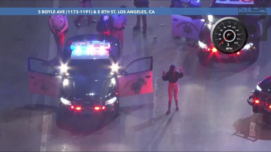 A female passenger surrendered to California Highway Patrol officers on August 16, 2024. (KTLA)