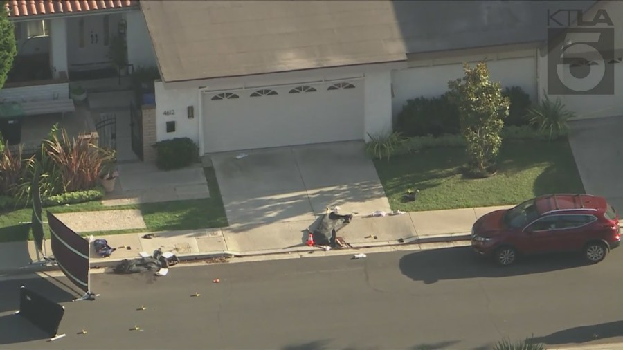 Police shot and killed a suspect who was seen stabbing a female family member outside an Irvine home on August 8, 2024. (KTLA)