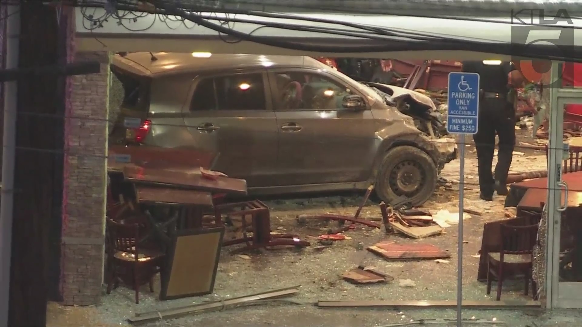 A woman was arrested after intentionally crashing her car into a taco shop in Canoga Park on August 9, 2024. (KTLA)