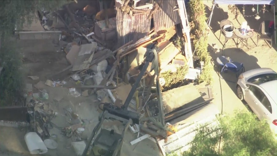 The home of the missing couple's next-door neighbor, Michael Sparks, was raided and destroyed by SWAT Team members and law enforcement on August 29, 2024. (KTLA)