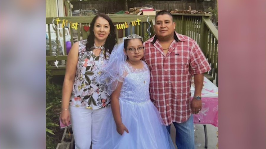 Delfino Guadalupe Lopez Fajardo, 47, is seen with his wife and daughter. (Fajardo Family)