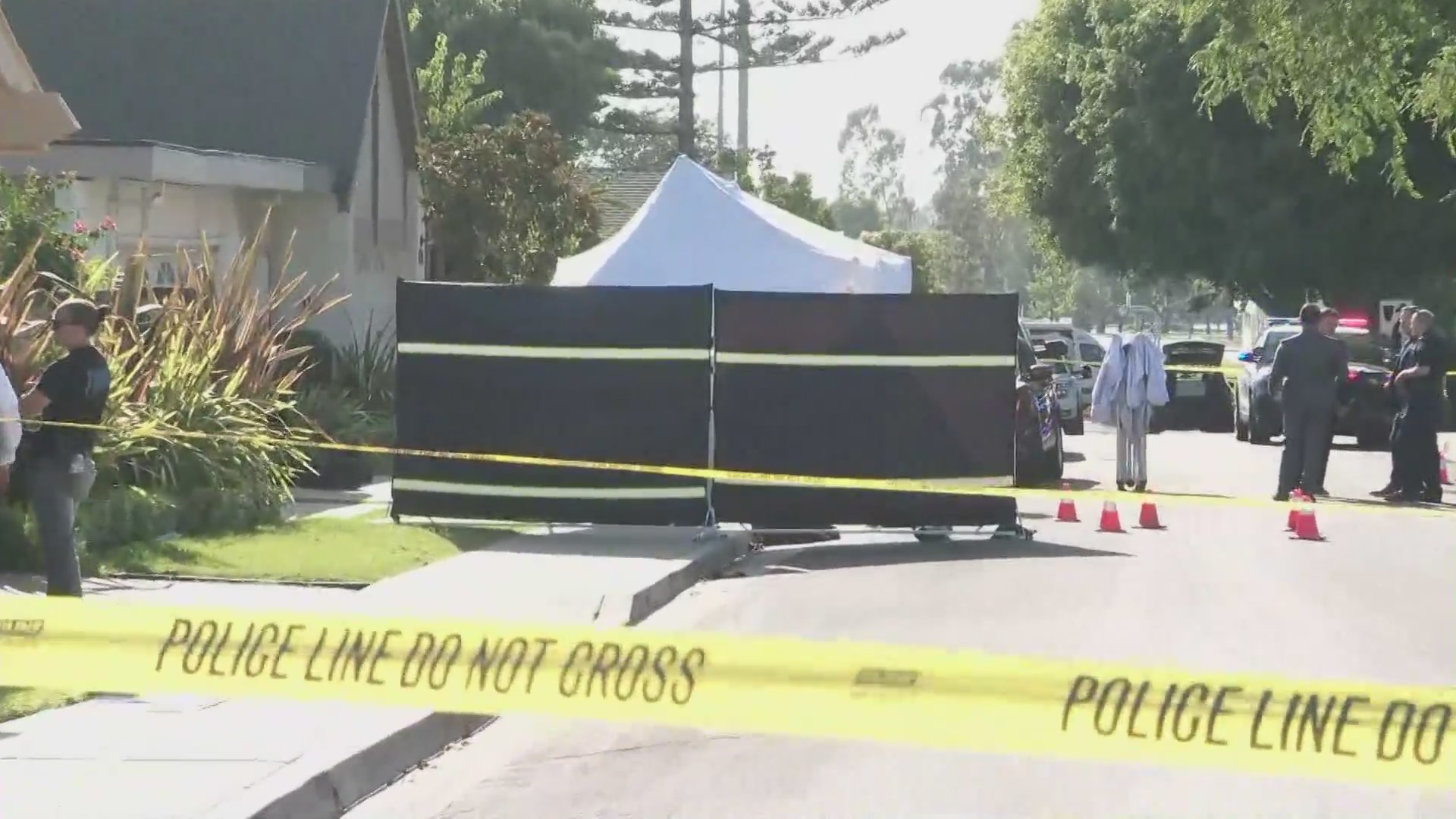 Police shot and killed a suspect who was seen stabbing a female family member outside an Irvine home on August 8, 2024. (KTLA)