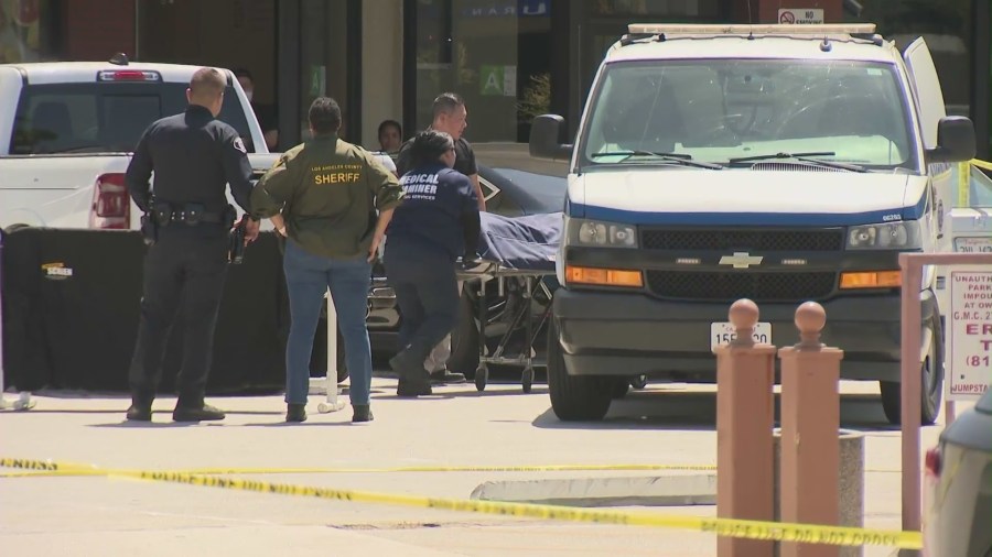 Authorities transport the victim's body after he was fatally shot at a Glendale strip mall on August 15, 2024. (KTLA)