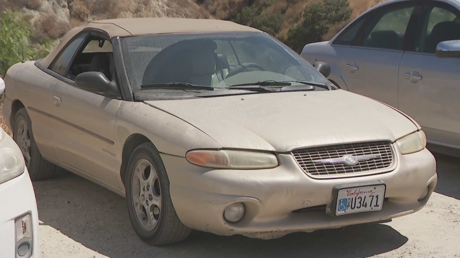 The missing couple's vehicle was found abandoned and unlocked down the road from their home in Redlands. (KTLA)