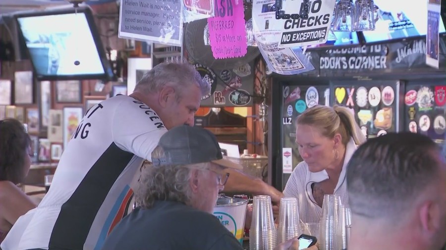 The popular biker bar, Cook's Corner in Trabuco Canyon, held a candlelight vigil on August 23, 2024, marking the one year anniversary of a deadly mass shooting. (KTLA)