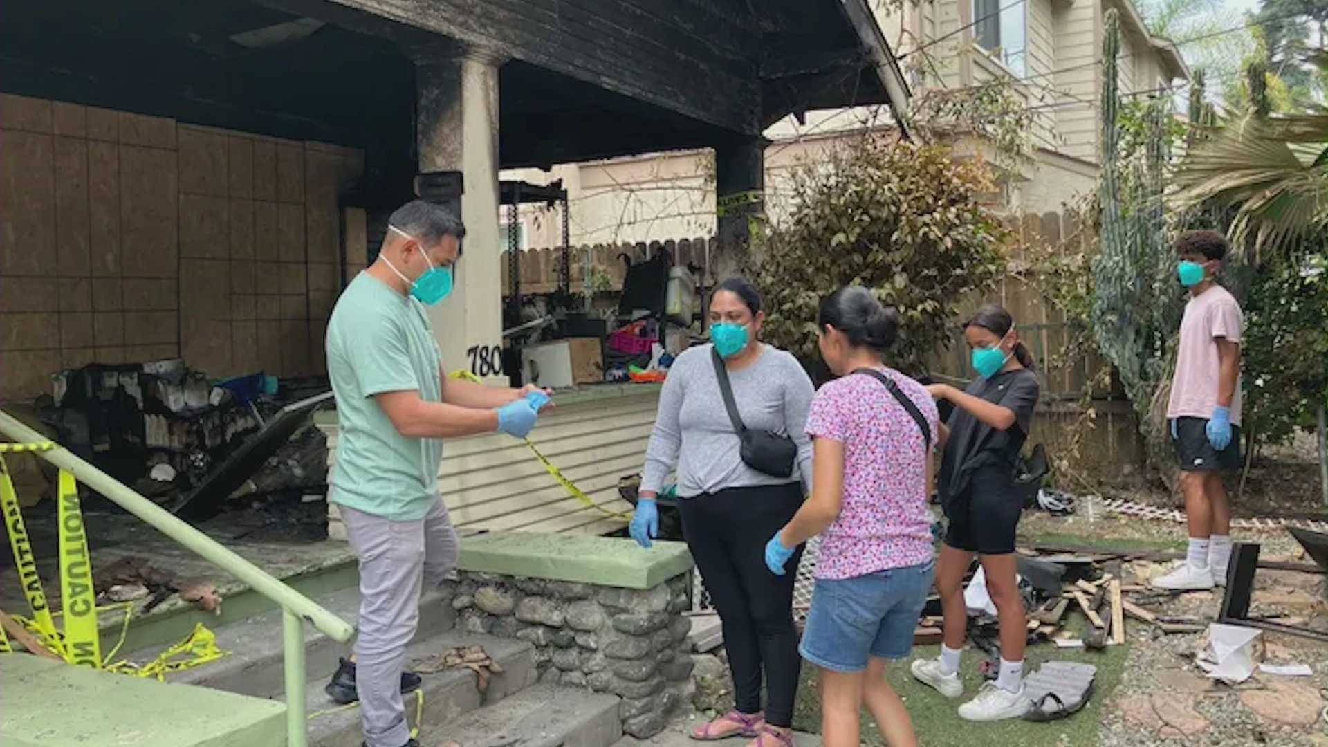 The Majano family, with the help of friends, family and neighbors, are salvaging whatever they can from their torched home. (GoFundMe)