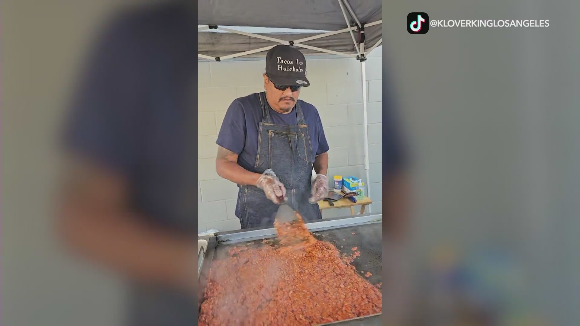 A crew members cooking up a hot meal for Skid Row residents. (@kloverkinglosangeles)