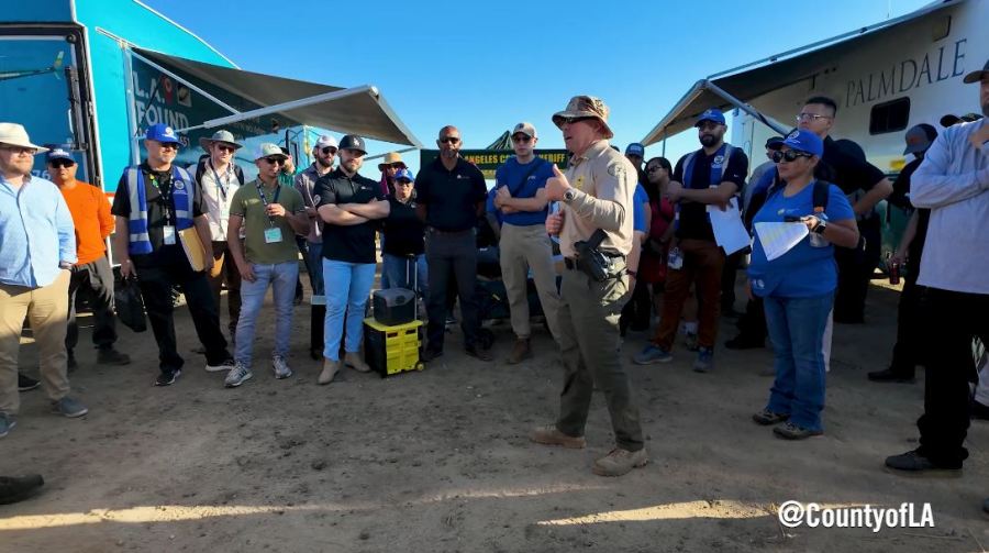 Workers gathered at a Palmdale homeless encampment to move 121 residents into safe indoor housing. (Los Angeles County)