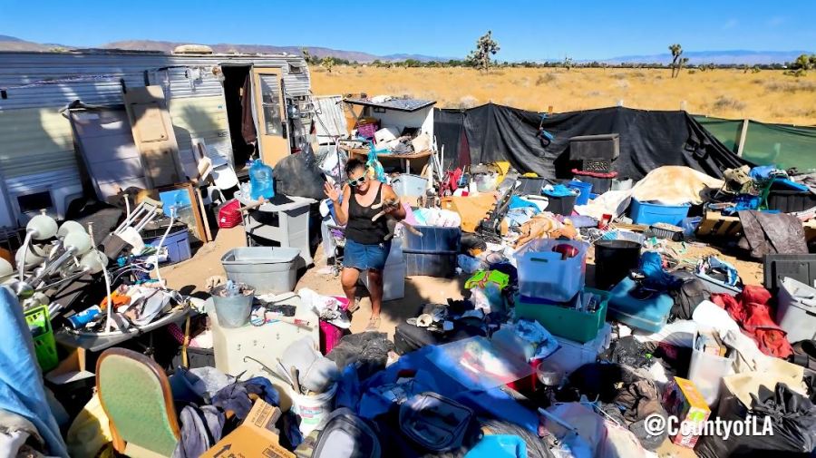 Kathryn McMullen and her cat were moved from a Palmdale homeless encampment into safe indoor housing. (Los Angeles County)