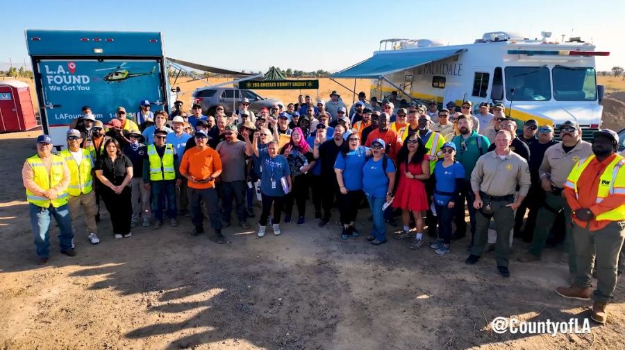 Workers gathered at a Palmdale homeless encampment to move 121 residents into safe indoor housing. (Los Angeles County)
