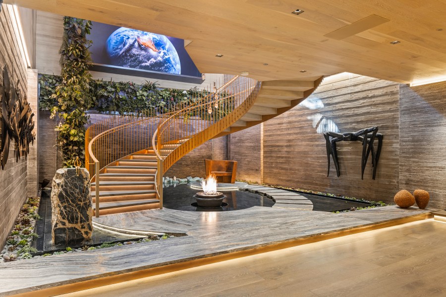 The spiral 'floating' staircase inside Villa Siena is shown in this undated photo by Anthony Barcelo. (The Beverly Hills Estates)