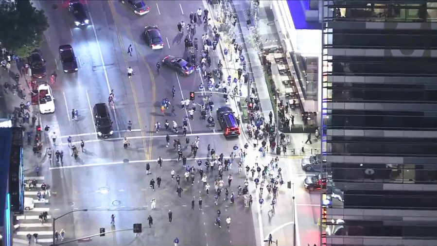 A dispersal order was issued in downtown Los Angeles as police formed a skirmish line to break up an unlawful assembly on Oct. 30, 2024. (KTLA)
