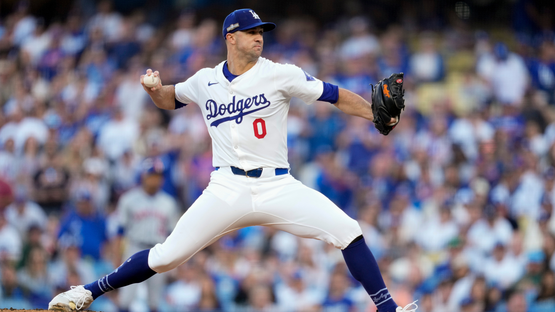 Los Angeles Dodgers pitcher Jack Flaherty throws against the New York Mets during the first inning in Game 1 of a baseball NL Championship Series, Sunday, Oct. 13, 2024, in Los Angeles. (AP Photo/Ashley Landis)
