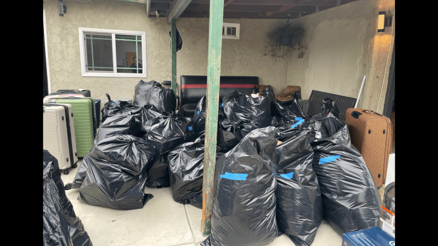 A variety of large bags and suitcases containing thousands of dollars worth of stolen merchandise was found at an a Bloomington home on Oct. 14, 2024. (California Highway Patrol)