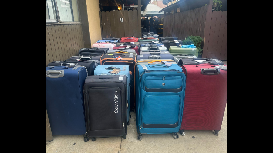Dozens of large suitcases containing thousands of dollars worth of stolen merchandise was found at an Anaheim home on Oct. 14, 2024. (California Highway Patrol)