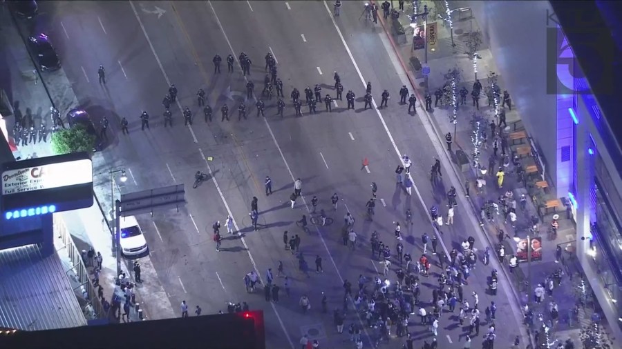 A dispersal order was issued in downtown Los Angeles as police formed a skirmish line to break up an unlawful assembly on Oct. 30, 2024. (KTLA)