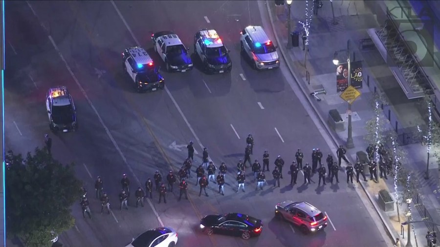A dispersal order was issued in downtown Los Angeles as police formed a skirmish line to break up an unlawful assembly on Oct. 30, 2024. (KTLA)