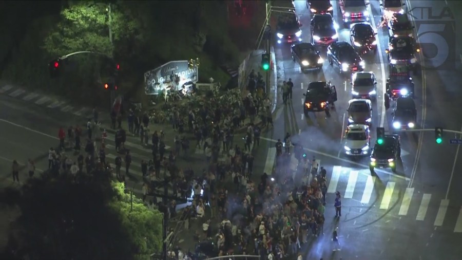 Fans outside Dodger Stadium celebrating the Dodgers' World Series win on Oct. 5, 2024. (KTLA)
