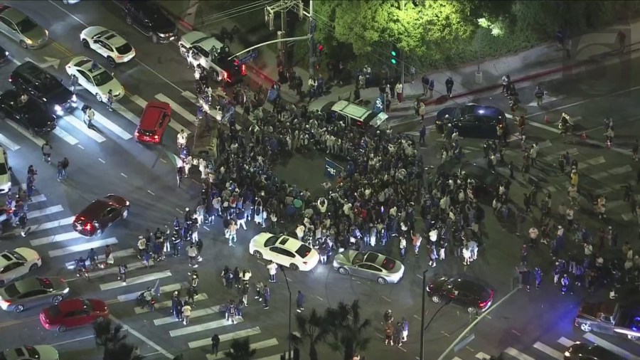 Crowds gathered near Douglas Street and Sunset Boulevard to celebrate the Dodgers' World Series win on Oct. 30, 2024. (KTLA)