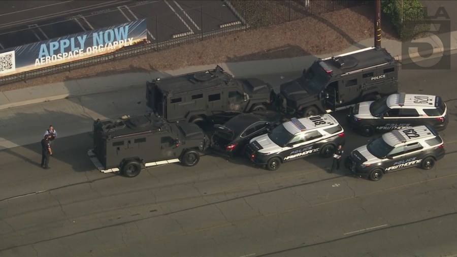 The suspect was boxed in by SWAT team vehicles and taken into custody after an hours-long standoff in El Segundo on Oct. 15, 2024. (KTLA)