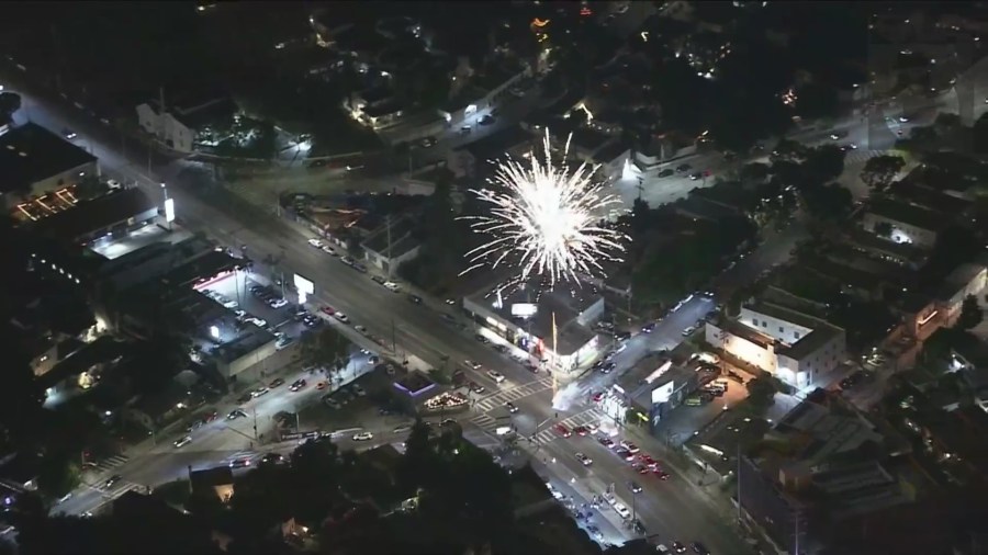 Fireworks go off as fans take to the streets to celebrate after the Dodgers captured their 8th World Series title, coming from behind to beat the New York Yankees 7-6 in Game 5 on Oct. 5, 2024. (KTLA)