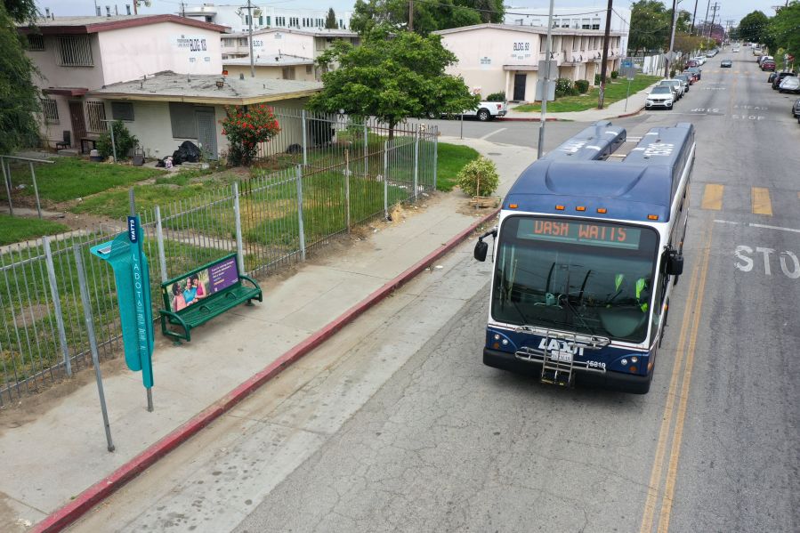 A DASH bus drives through the Watts neighborhood of Los Angeles on May 25, 2023. (Getty Images)
